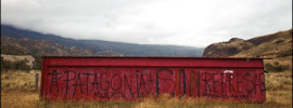 Anti-dam graffiti along the Carretera Austral Photograph by Michael Hanson