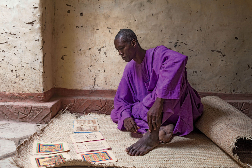  Koranic expert Dramane Moulaye Haidara, like many in Timbuktu, hid his manuscripts ­during the jihadi occupation.   Photo: Marco Di Lauro/Reportage by Getty Images 