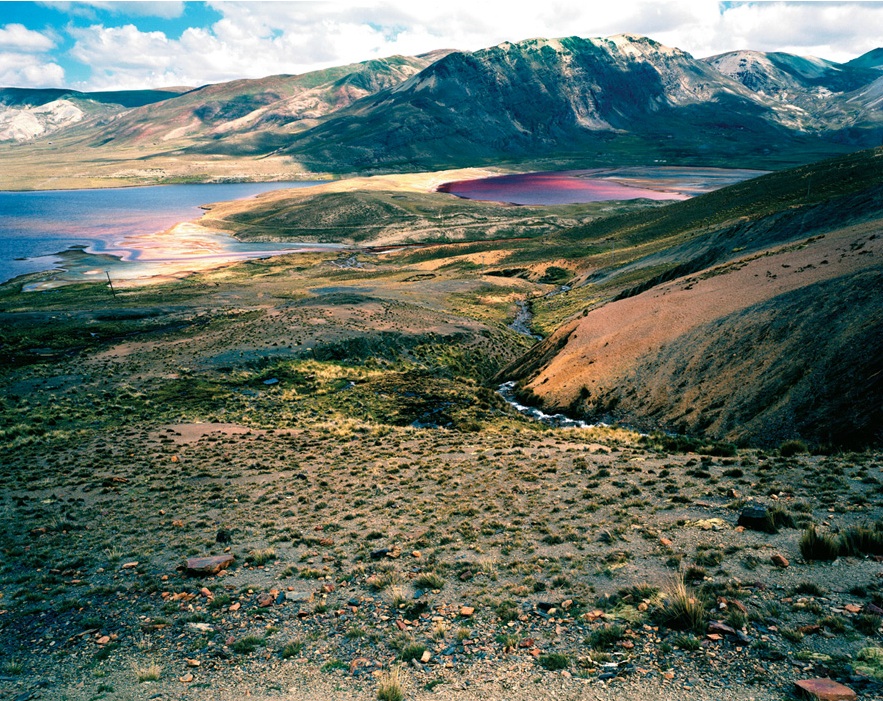 The Cordillera Real Mountains, just outside La Paz, surrounding Laguna Milluni -- the water gets its color from the runoff of a nearby mine. Photographs by Olaf Otto Becker